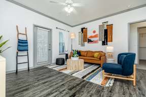 a living room with a couch and a chair