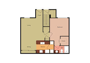A room with a ceiling fan and two doors.