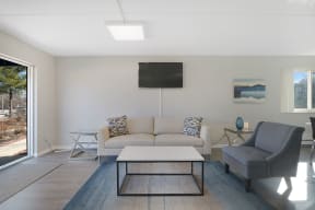 a living room with a couch and a coffee table