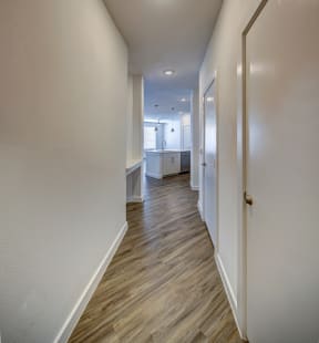 hardwood flooring in. the hallway at Brixton South Shore, Austin, TX