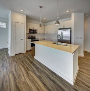 kitchen with an island at Brixton South Shore, Austin, TX, 78741