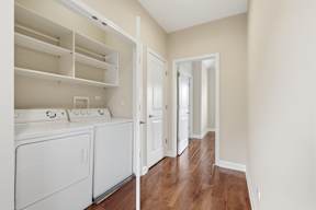 A laundry room with a washer and dryer.