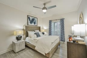 bedroom with white comforter set