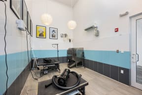 a hospital room with a surgery room with surgery equipment and a patient bed
