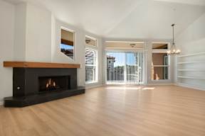 a living room with a fireplace