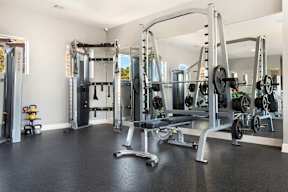 a gym with a lot of equipment