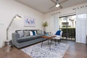 living room with grey sofas