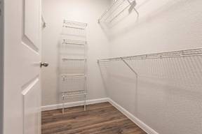 closet with shelving units