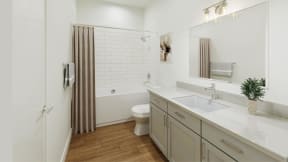 a bathroom with a sink and a toilet and a shower