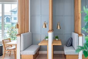 a seating area with two chairs and a table