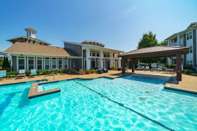 the preserve at ballantyne commons pool with apartment buildings in the background