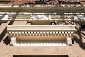 A close up of a building's balustrade.
