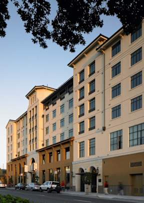 A large building with a lot of windows is shown.