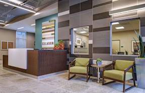 A reception area with a sign that says Celadon on it.