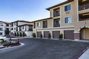 Apartment complex with a fire lane in front.