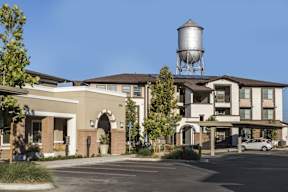 A large building with a water tower on top of it.