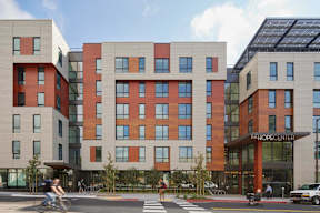 A modern building with a glass facade and a sign that reads "The Hope Center.".