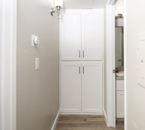 Extra storage space in hallway near bathroom