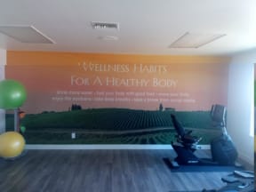 a wall with a picture of a field and the words wellness habits for a healthy body