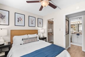 a bedroom with a bed and a ceiling fan at The Bentley at Maitland, ORLANDO, FL