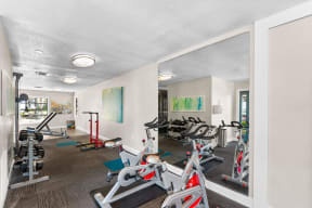 a resident fitness center with treadmills and other exercise equipment at The Bentley at Maitland, ORLANDO