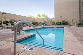 Apartments in Midtown Sacramento, CA- The Penthouses at Capitol Park- Sparkling Pool and Spa Surrounded By Lounge Seating