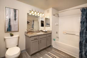 High Rock bathroom with vanity and tub