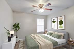 an empty bedroom with a bed and a ceiling fan