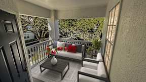 A balcony with a table and chairs overlooking a garden.