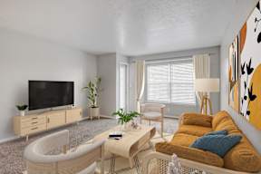 a living room with a couch and a television