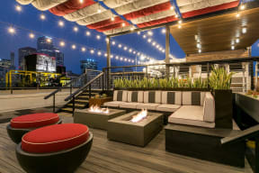 Apartments for Rent in Downtown Los Angeles CA - Santa Fe Lofts - Rooftop Lounge with Fire Pits, BBQ Area. and Lounge Seating.