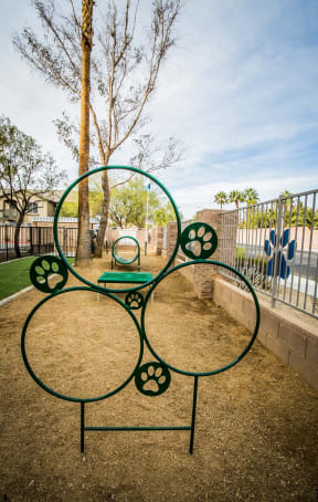 a playground with a round table and a ball in the middle
