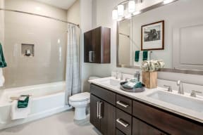 Apartments in Chandler AZ for Rent-The Core Chandler Bathroom with Large Bathtub and Spacious Vanity Area with Double Sinks