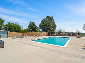 outdoor swimming pool with lounge chairs