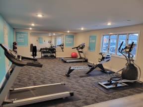 fitness center at Retreat on 6th Apartments