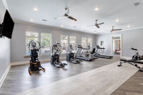 the gym has cardio equipment and treadmills in it