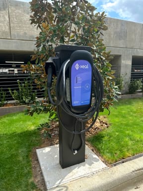 a public phone in front of a building