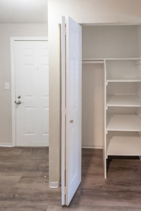a walk in closet in a 555 waverly unit