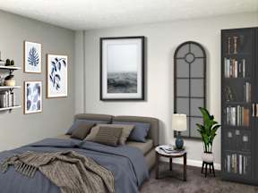 a bedroom with a bed and a book shelf