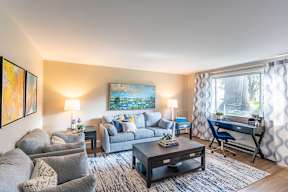 a living room with a couch and a table
