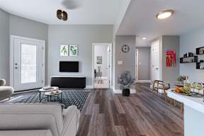 Big living room with tall ceilings at Townhouse Apartments