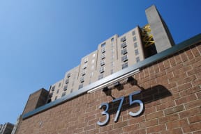 Exterior View of William S. Moorhead Tower with Street Number.