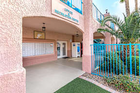 A pink building with a sign that says Office Recreation Center.