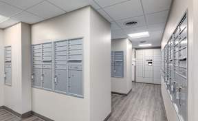 A long hallway with a row of lockers on the left and right.