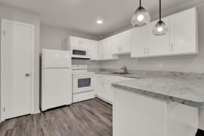 Kitchen lights and appliances at Oakwood Manor, Bay Shore, NY 11706