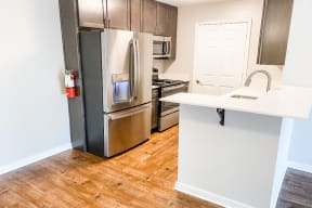 Open Kitchen Area at The Woodlands Apartment Homes, Mississippi, 39301