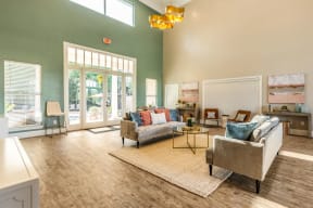 a living room with two couches and a coffee table