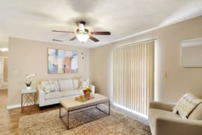 a living room with two couches and a coffee table