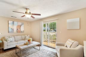 a living room with two couches and a coffee table