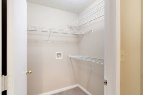 a walk in closet in a 555 waverly unit